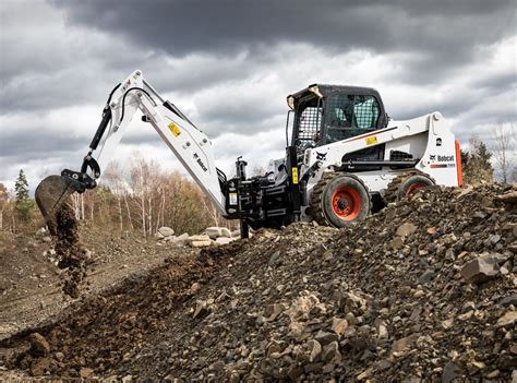 changing attachment on bobcat skid steer video|bobcat attachments price list.